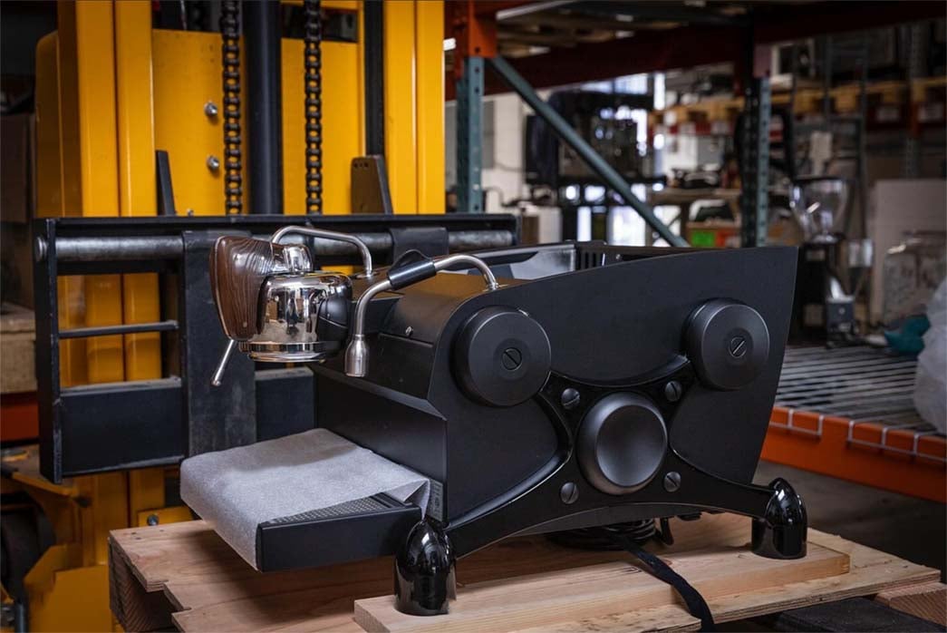 photo of slayer espresso machine on workbench